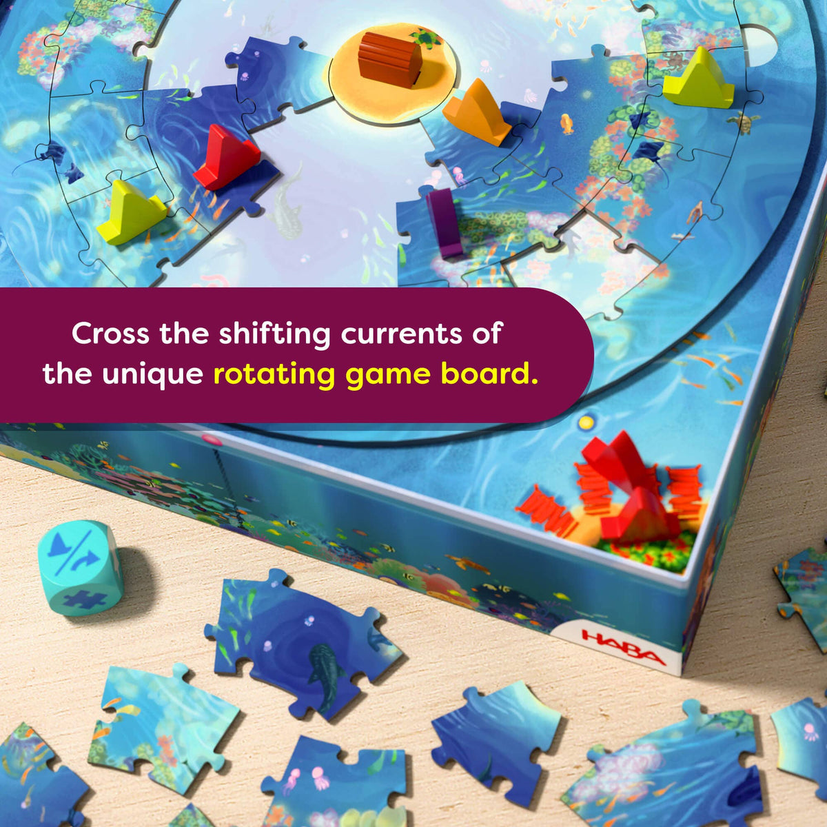 Colorful puzzle game with rotating board and scattered pieces on a wooden surface.