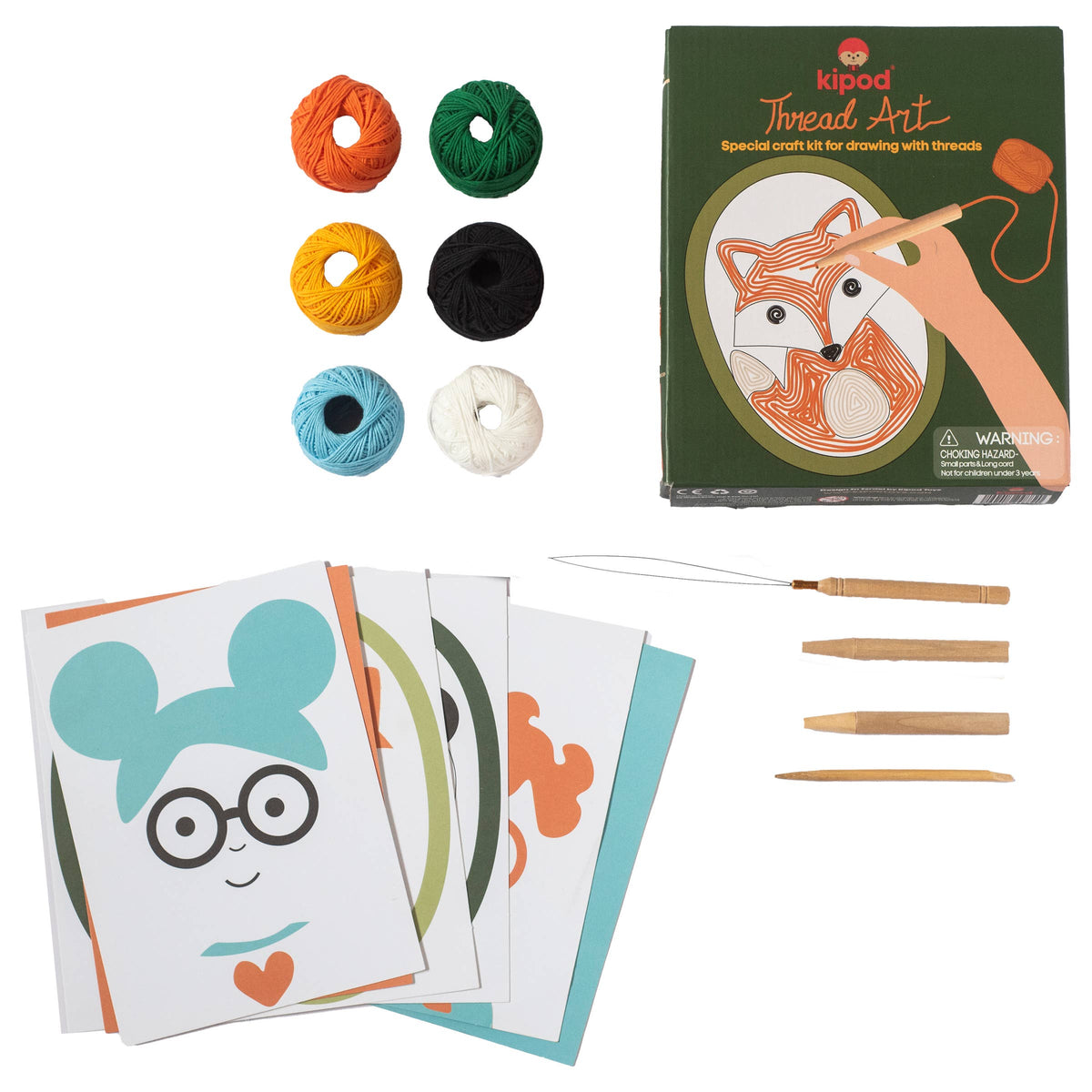 Thread art craft kit with yarn balls, design cards, and tools on a white background