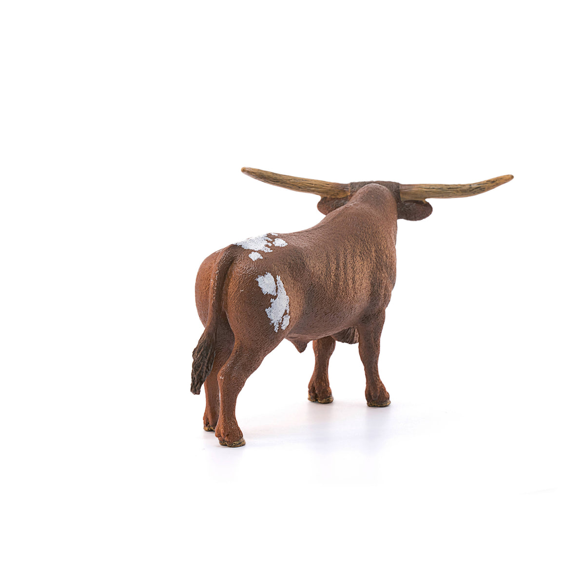 Model of a longhorn bull on a white background