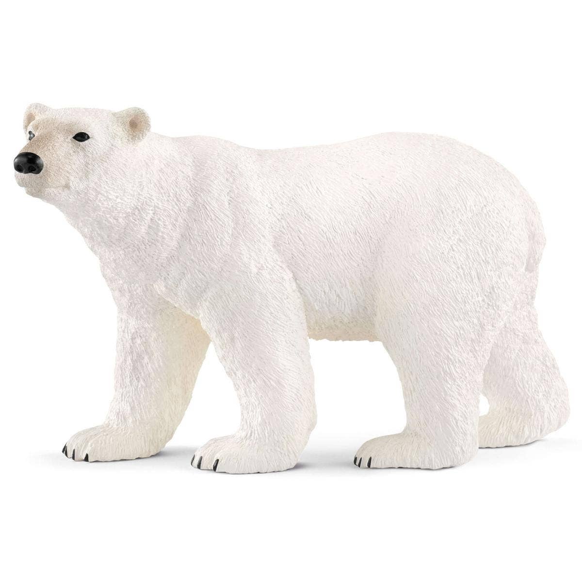 White polar bear figurine on a white background