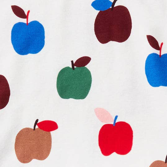 A baby long-sleeve footless one-piece pajama in white, featuring an all-over pattern of colorful stylized apples in red, blue, green, brown, and pink, laid flat on a light gray background.