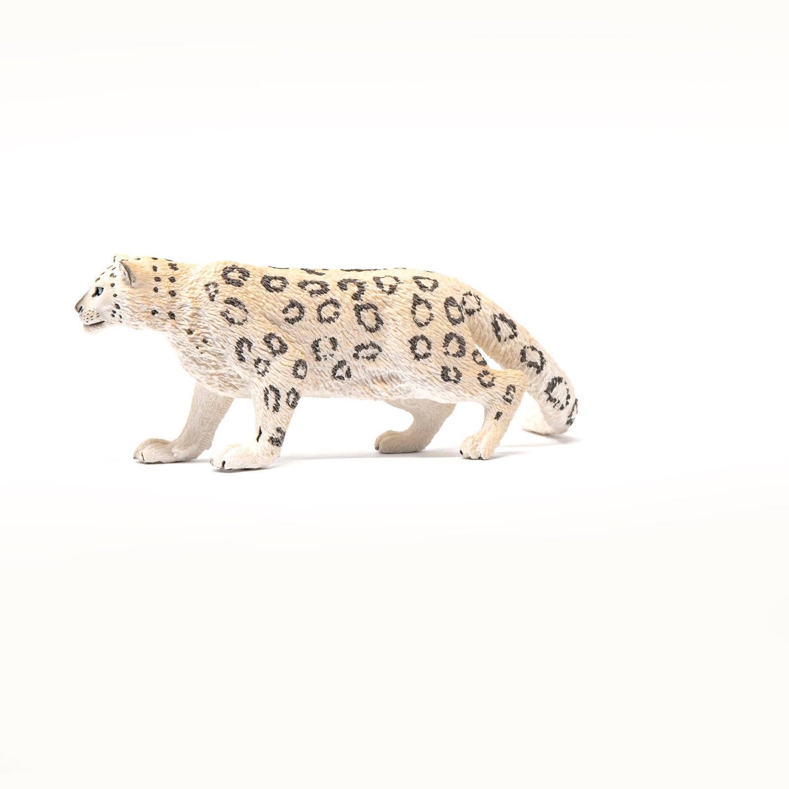 Snow leopard figurine on a white background