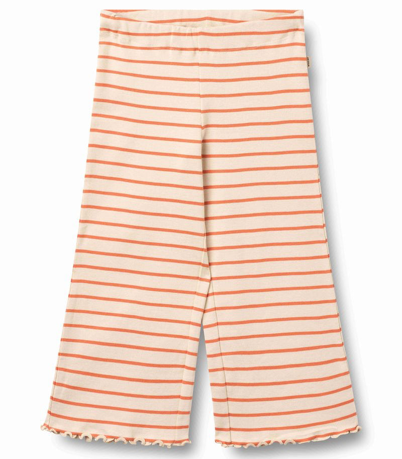 Striped pants with orange and white stripes on a white background