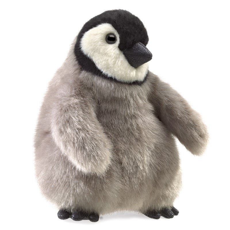 Plush toy penguin on a white background