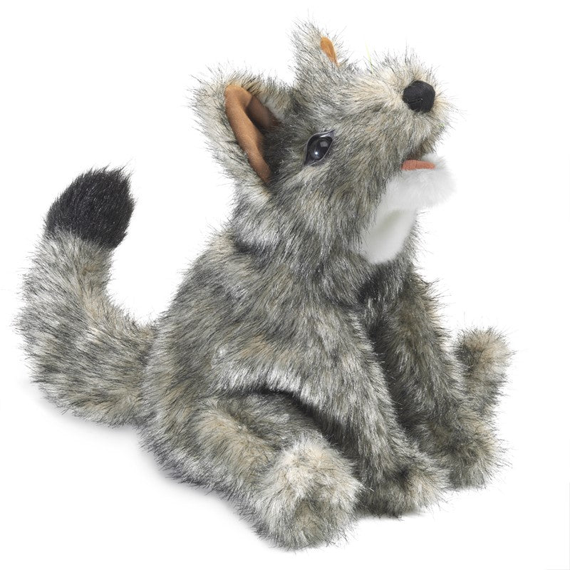 Plush toy resembling a gray and black animal on a white background