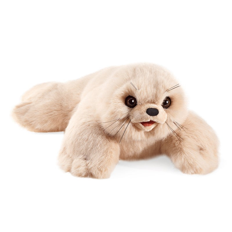 Plush toy seal on a white background