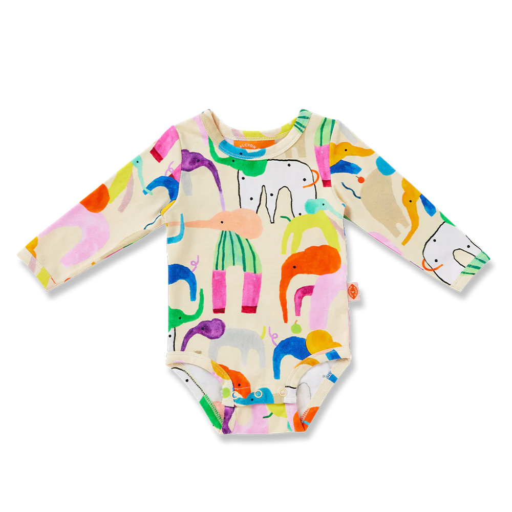 Colorful baby onesie with animal pattern on a white background