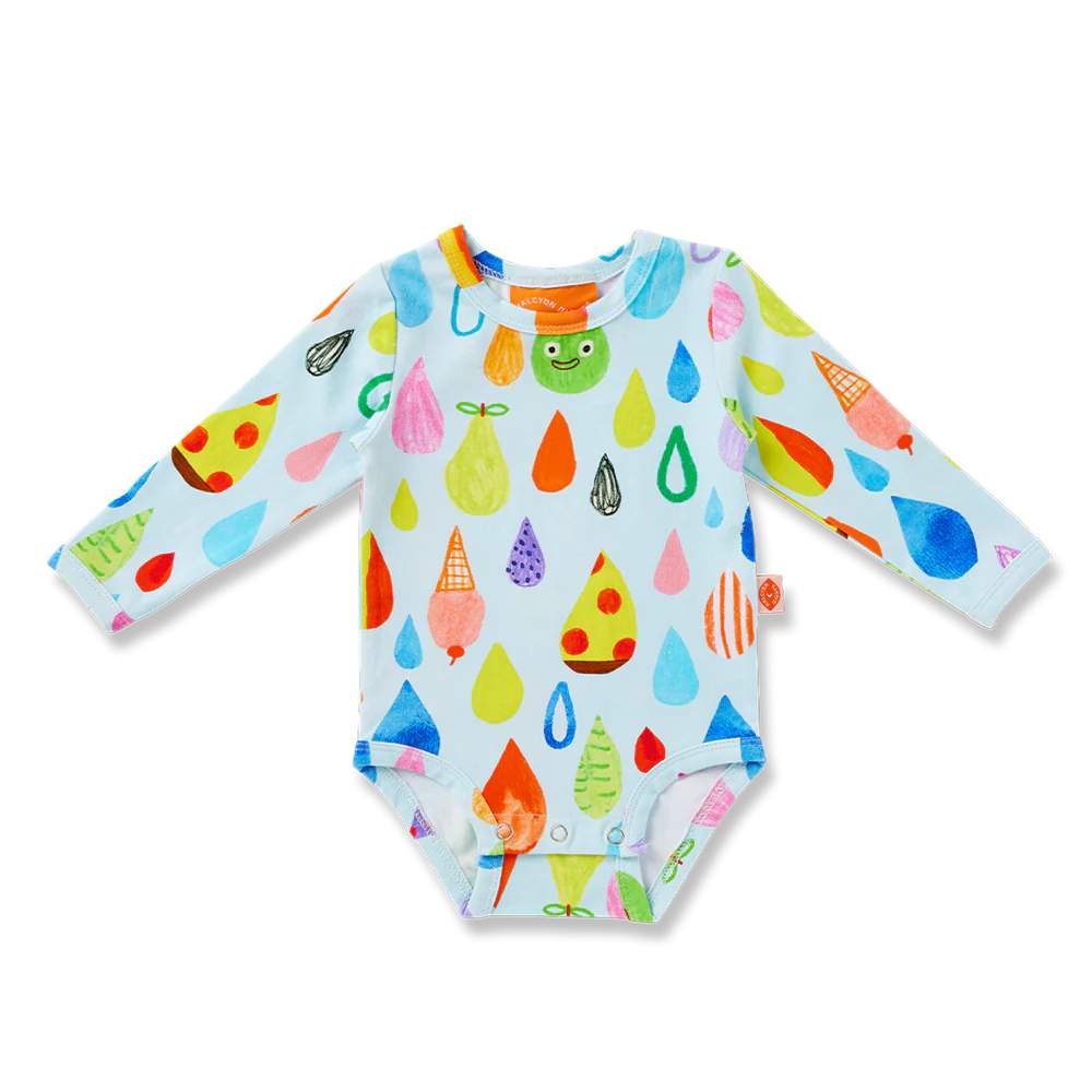 Colorful baby onesie with rain drop pattern on a white background