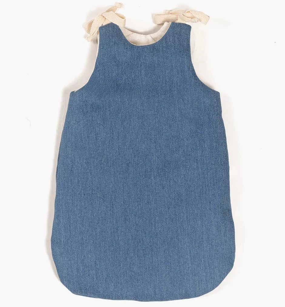 Blue sleep sack with white trim on a white background