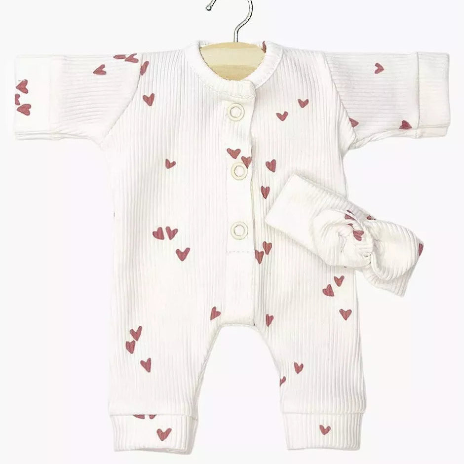 Baby romper with heart patterns on a white background