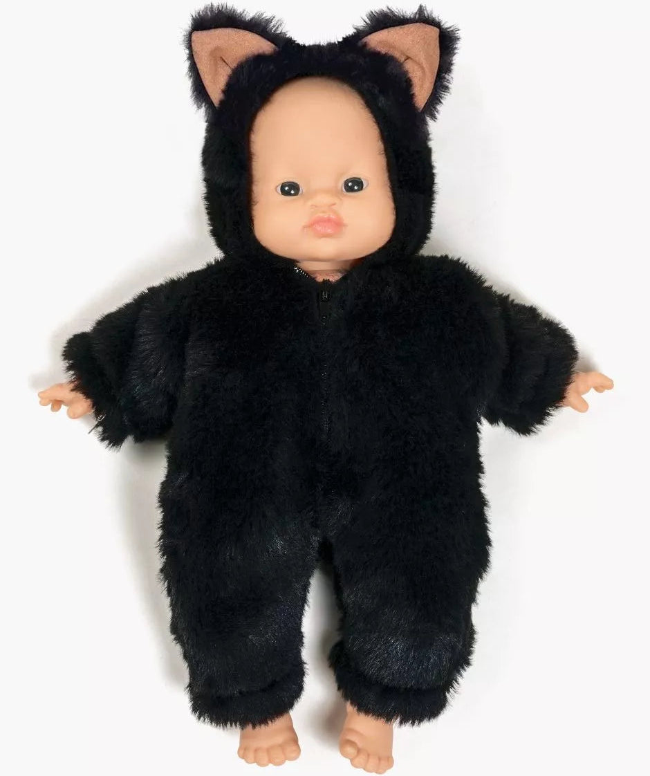 Doll wearing a black fluffy cat costume on a white background
