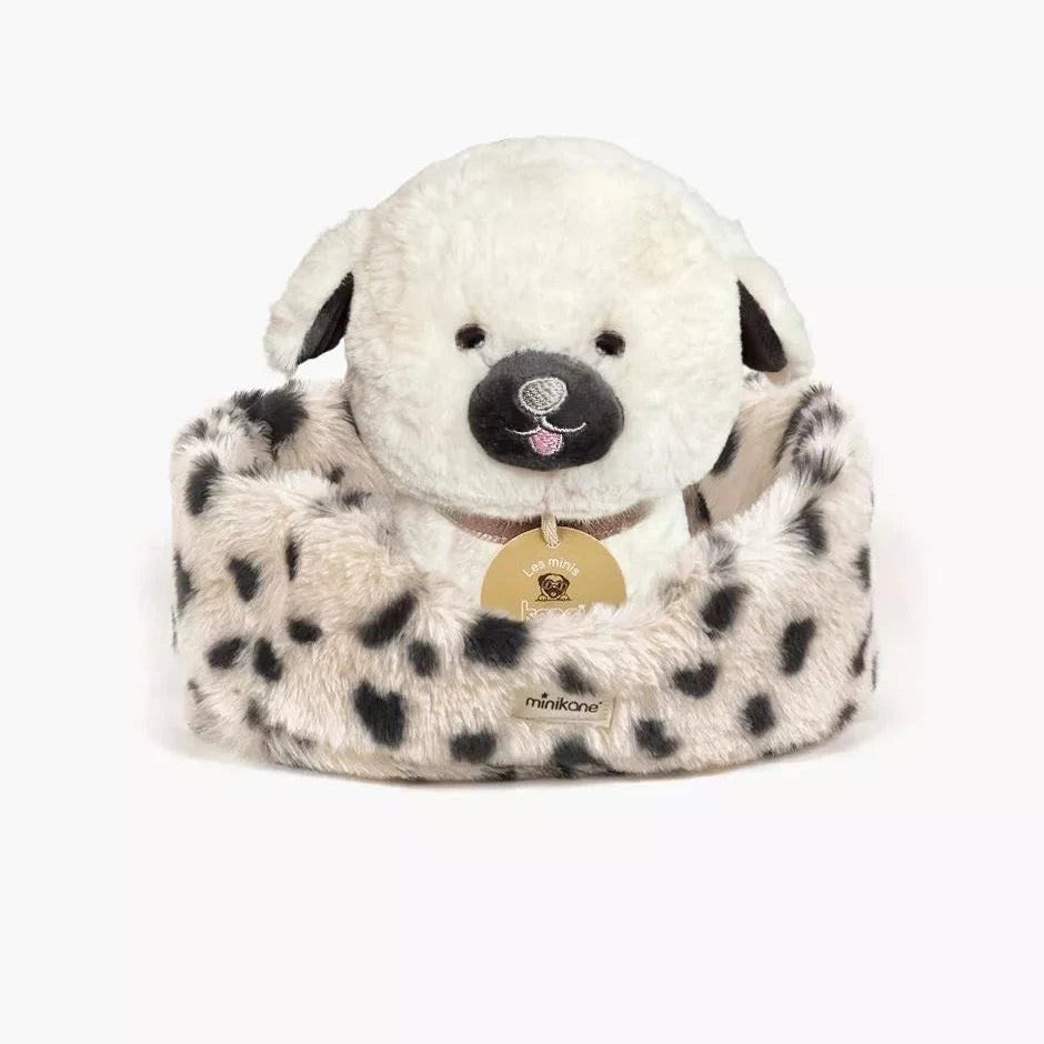 Plush dog toy with dalmatian pattern on a white background