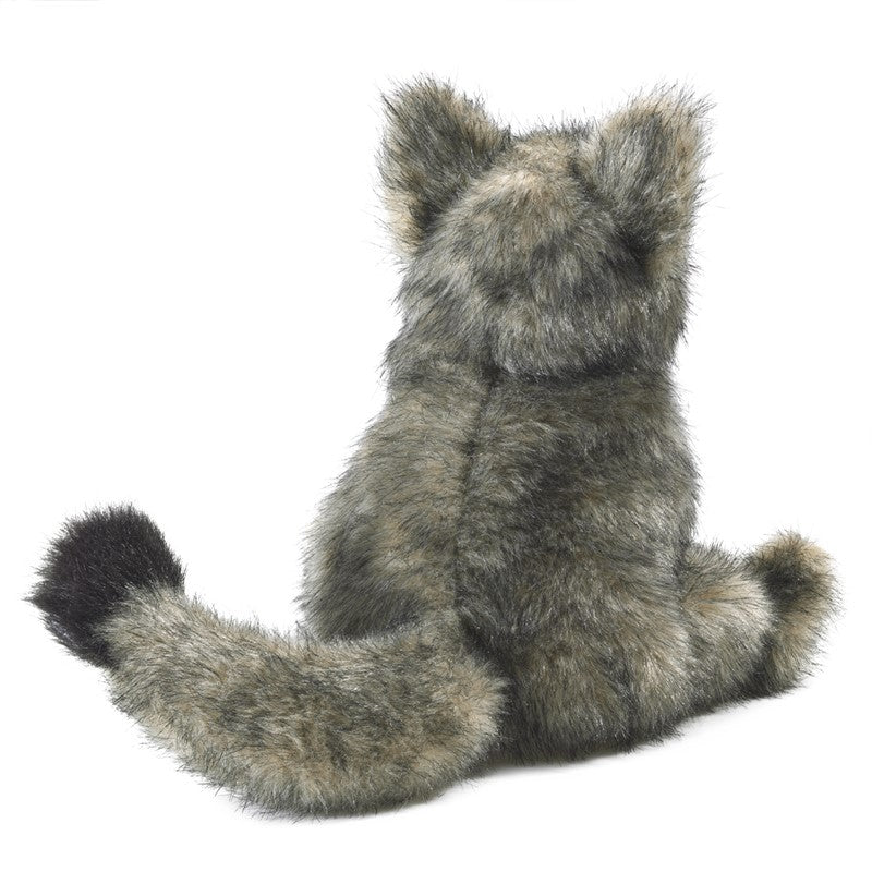 Plush toy resembling a gray and black animal on a white background