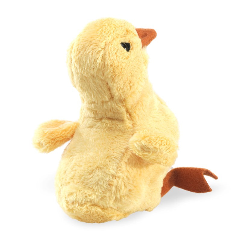 Young girl holding a plush duck toy against a white background