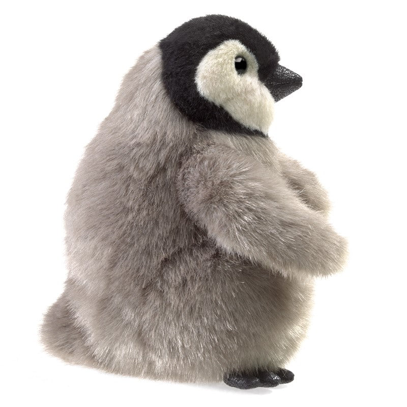 Plush toy penguin on a white background