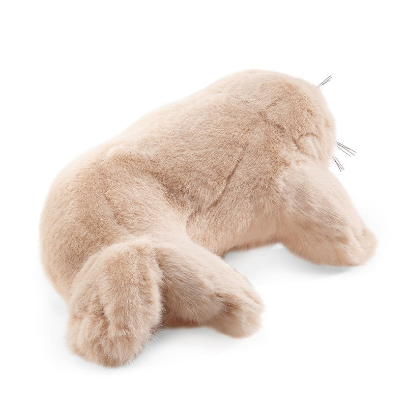 Plush toy shaped like a seal on a white background