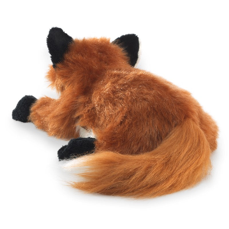 Plush toy fox on a white background