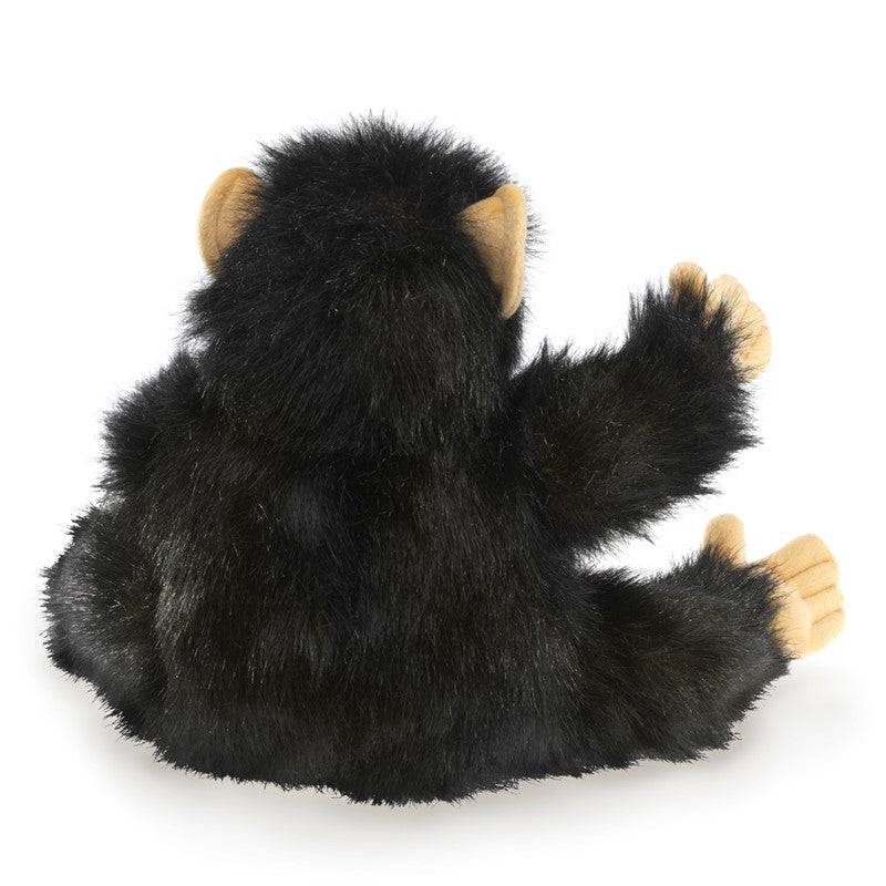 Plush monkey toy on a white background