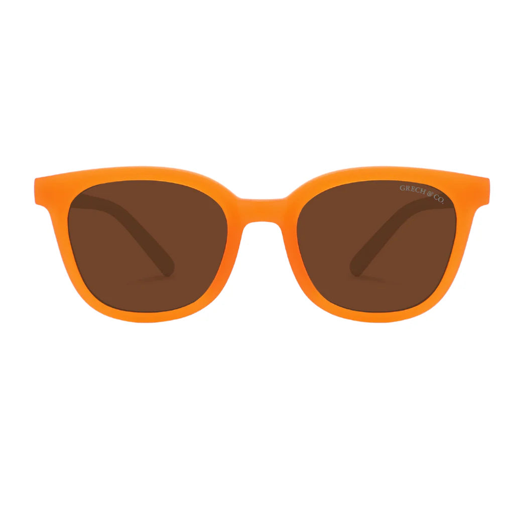 Orange sunglasses with brown lenses on a white background