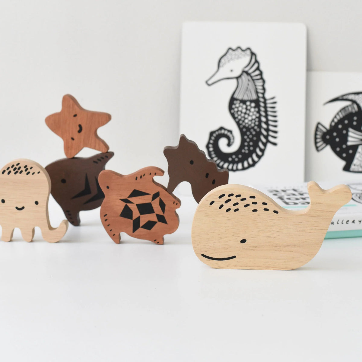 ocean puzzle pieces that are stacked and on display